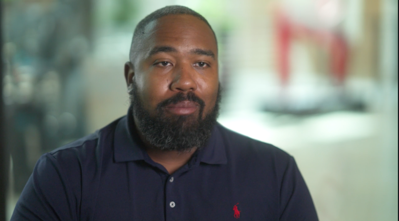 Dwight M looking into the camera during an interview